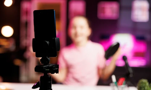 close-up-professional-recording-smartphone-camera-used-by-gen-z-internet-star-livestream